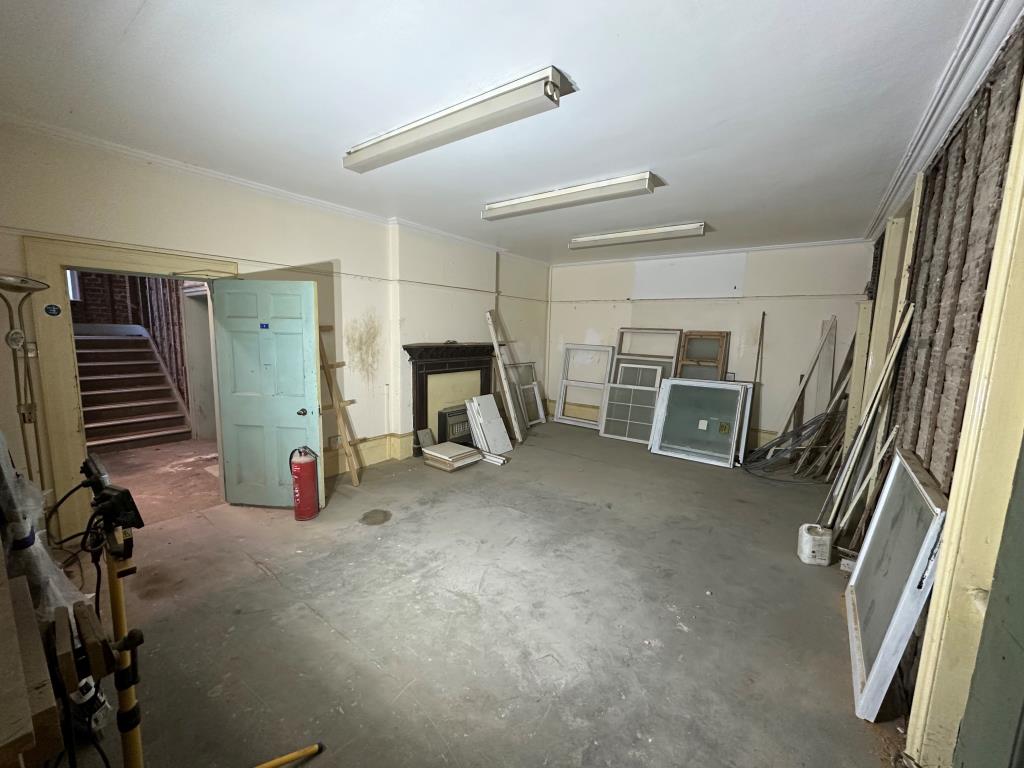 Lot: 89 - PERIOD PROPERTY WITH PLANNING FOR SEVEN FLATS - Ground floor room with fireplace